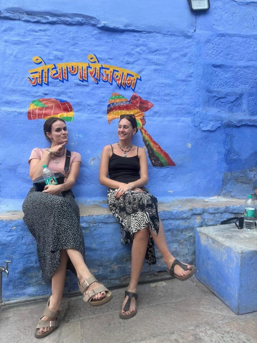 Resting beneath a Jodhana Rajwada mural